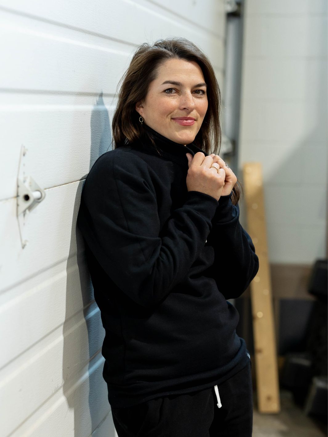 Individual wearing the black Local Laundry Greenview 3/4 zip sweater. 
