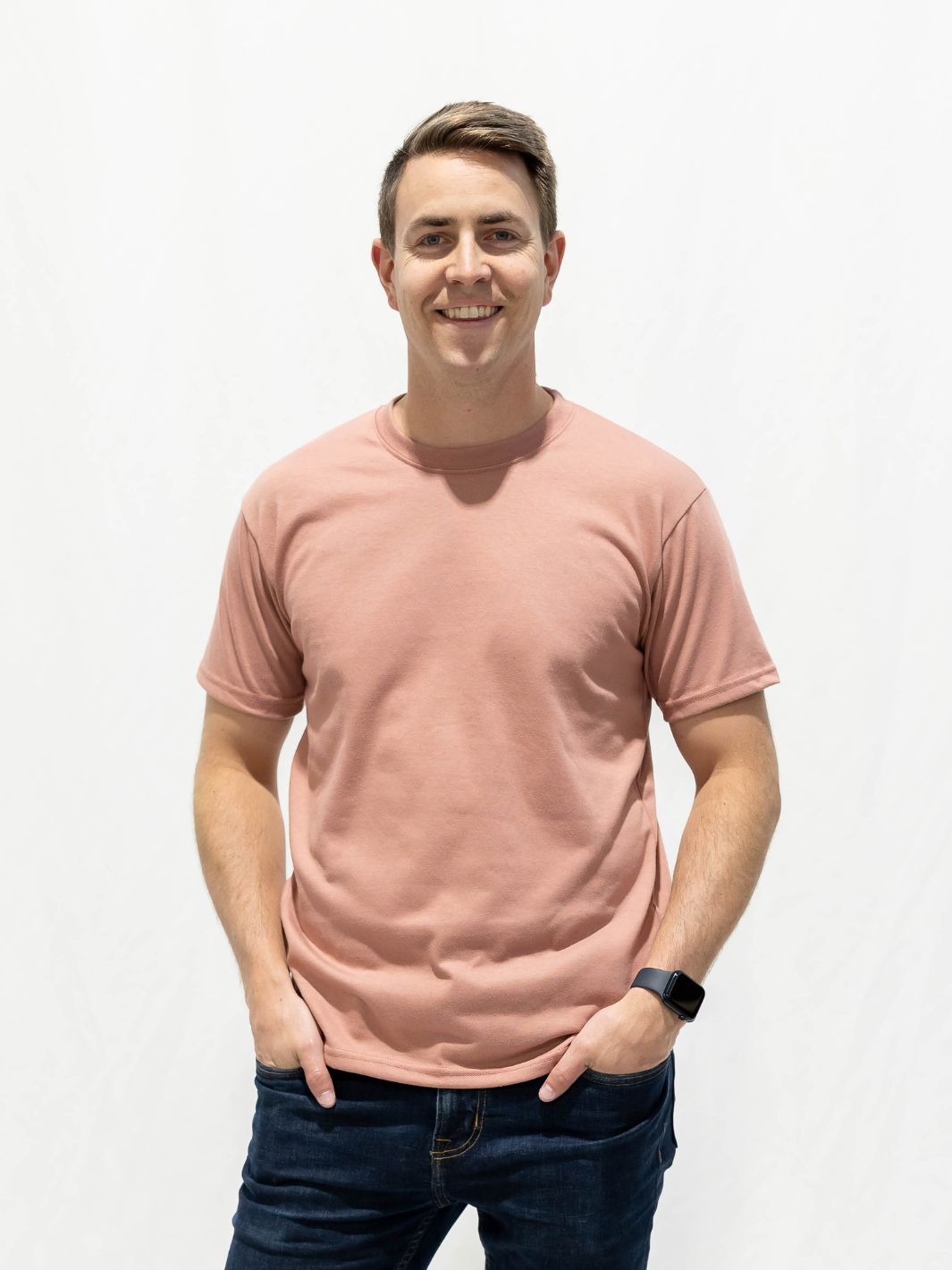Individual sporting a made in Canada Local Laundry Barrier Tshirt in Dusty Rose