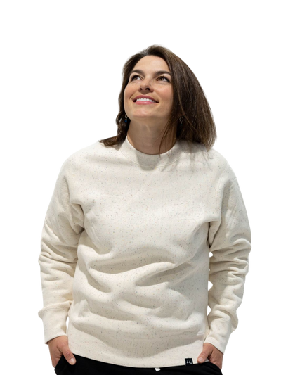 Individual sporting Local Laundry's heavyweight speckled crewneck sweater. This sweater is made of 100% ethically sourced cotton and is sustainably made in Canada