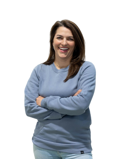Smiling individual in a soft, comfortable, high-quality Edworthy Fleece sweater, a Canadian-made, powder-blue sweater