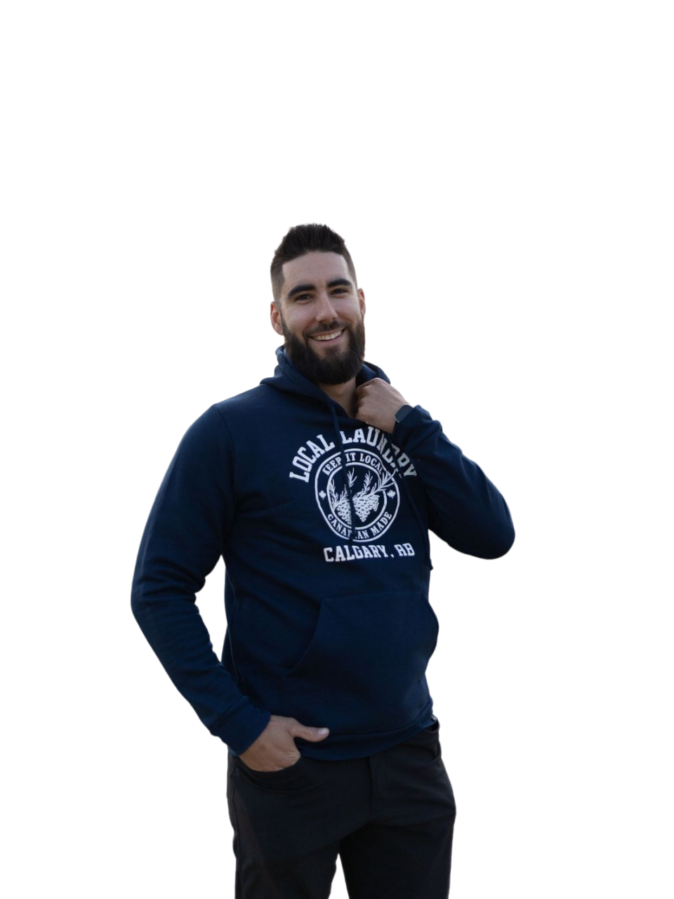 individual wearing the Local Laundry Varsity hoodie in navy blue with a white graphic on the front torso. This hoodie is sustainably made in Canada from a premium blend of 50% cotton, and 50% polyester