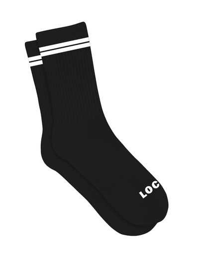 The Local Laundry Giving sock in black with white contrast stripes. Made in Canada and constructed from Bamboo for extra comfort and warmth