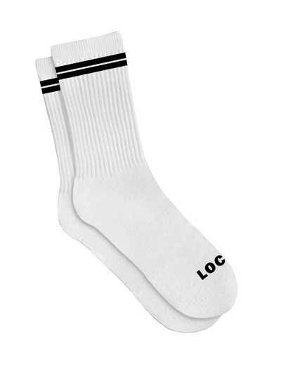 The Local Laundry Giving sock in white with black contrast stripes. Made in Canada and constructed from Bamboo for extra comfort and warmth