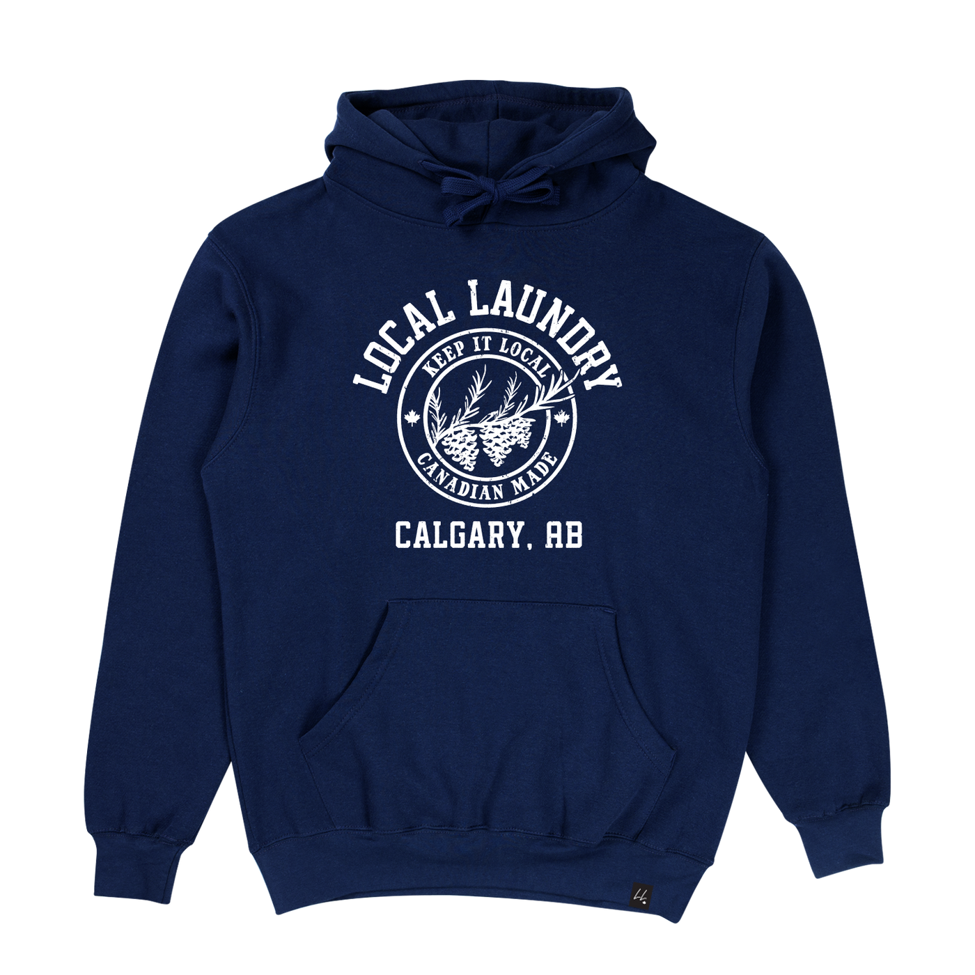 The Local Laundry Varsity hoodie in navy blue featuring a white graphic on the front torso. The graphic features a crest with three pine cones and "Keep it Local" on the top and "Canadian Made" on the bottom. This garment is sustainably made in Canada, utilizing a premium blend of 50/50 cotton and polyester.