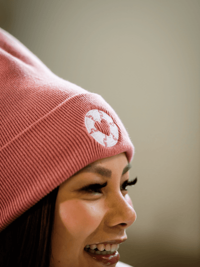 Local Laundry Ryder's toque in Dusty Rose featuring a white sewn heart patch. Made in Canada and all proceeds from this toque are donated towards charities for autism.