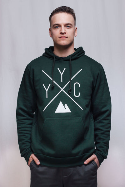 Individual wearing the Local Laundry YYC hoodie, featuring the Local Laundry exclusive YYC graphic in a contrasting white print. This piece is sustainably made in Canada.